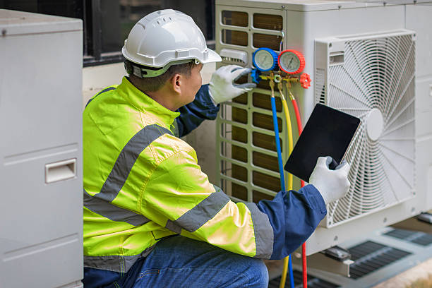 Professional Emergency Hvac Repair technician working in Brookville, NY